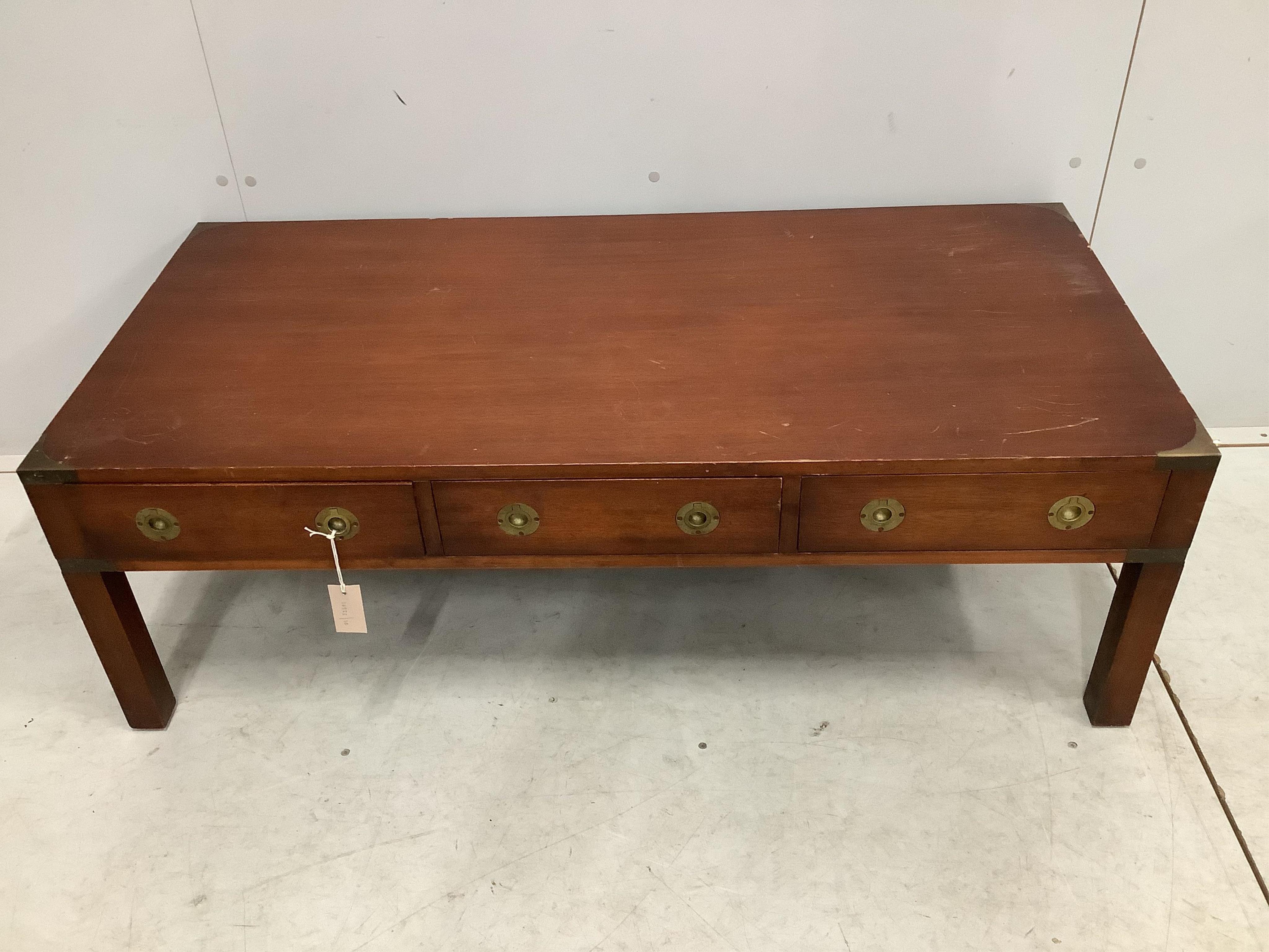 A military style brass mounted rectangular mahogany coffee table, dummy drawers to one side, width 122cm, depth 58cm, height 41cm. Condition - fair